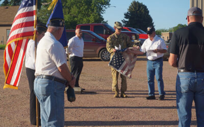 Ole Alendal Post holds flag disposal ceremony