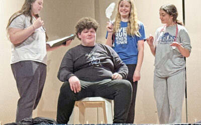 Fourteen students participating in I-W All School Play